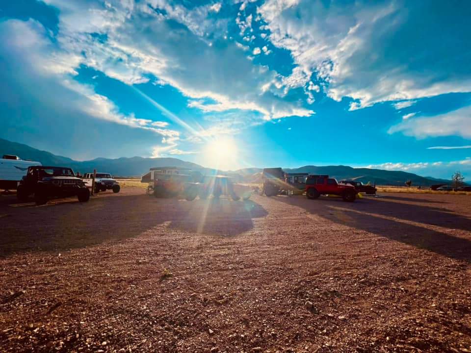 Off-road vehicles at sunset